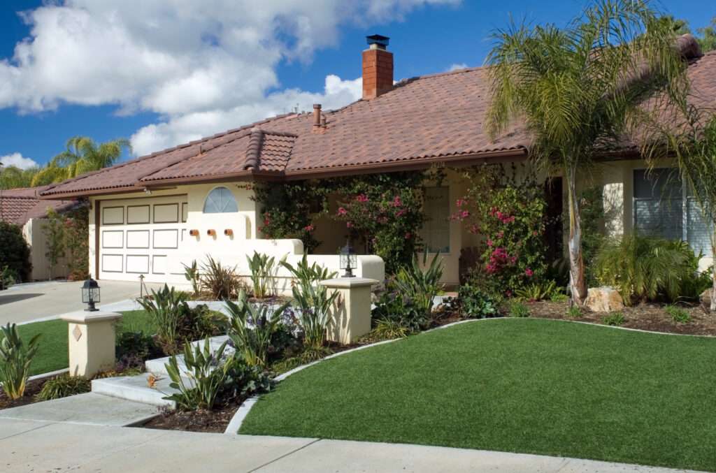 An Aerial View of a Modern House Showcasing Artificial Turf Maintenance in Las Vegas, NV